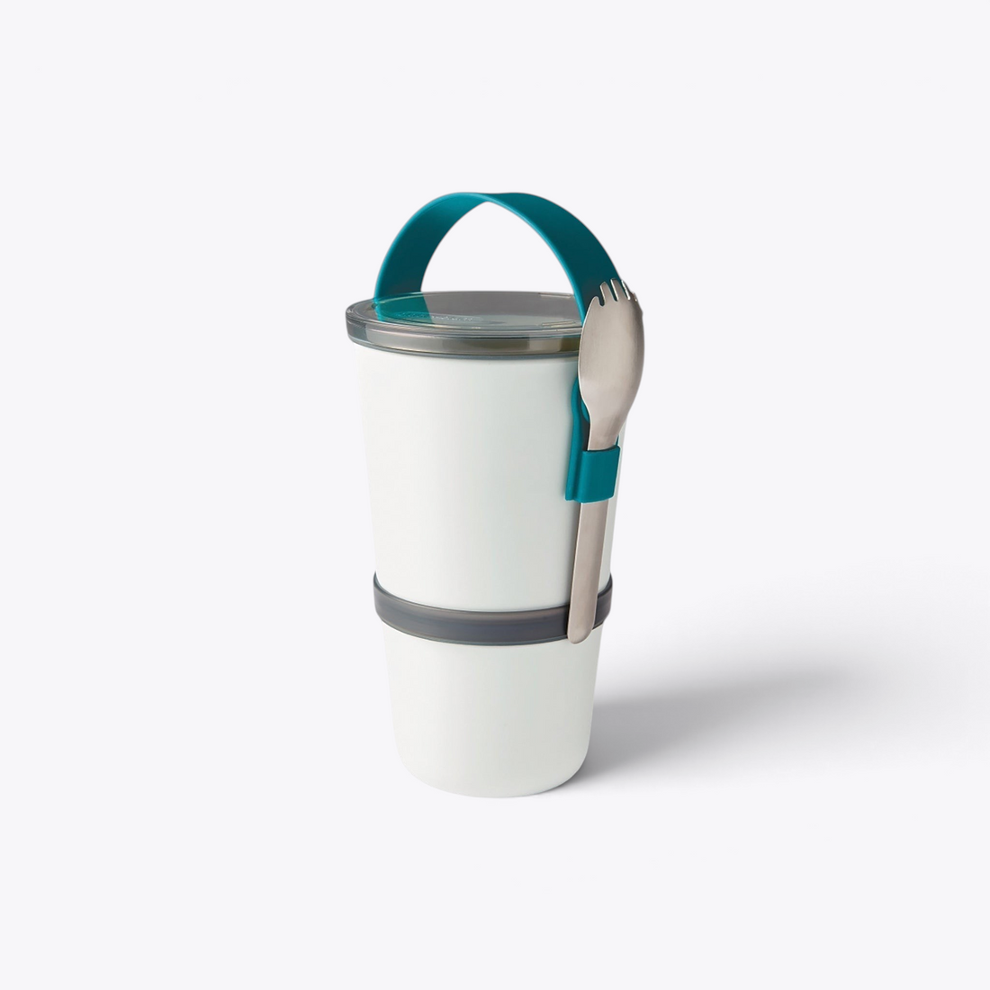 Lunchpot Black+Blum blanc avec anse turquoise et couvert fixé, vue trois quarts
