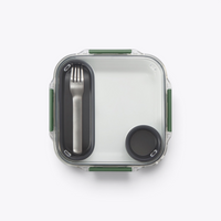 Lunchbox Black+Blum blanche à attaches vertes, vue de dessus