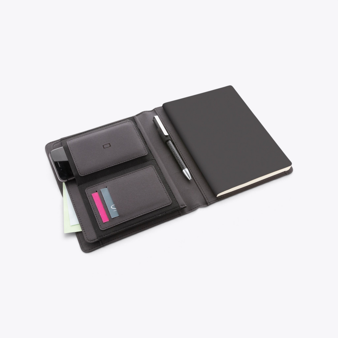 Conférencier A5 noir ouvert avec carnet, stylo et rangements