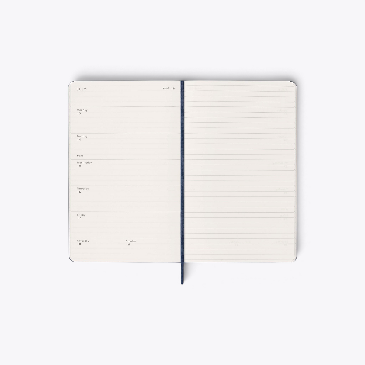 Agenda Moleskine bleu marine ouvert sur une semaine avec page de notes