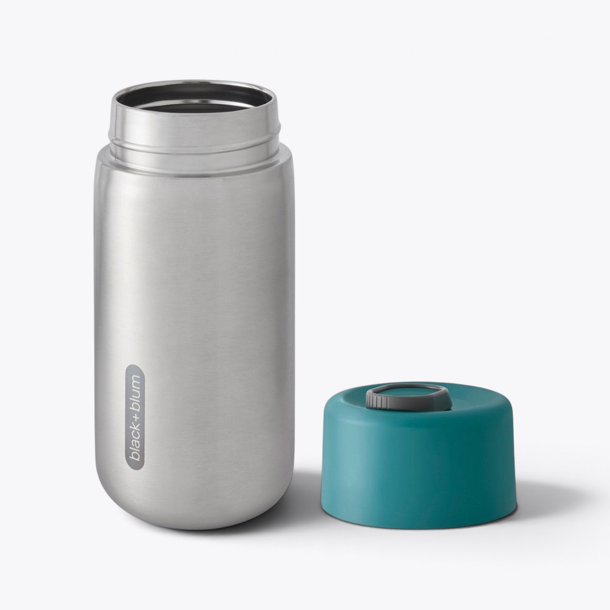 Gobelet isotherme Black+Blum bleu ouvert, couvercle retiré