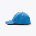 Casquette bleue, vue de profil gauche