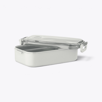 Lunchbox blanche ouverte avec compartiment en acier visible