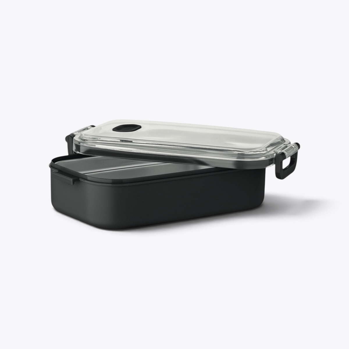 Lunchbox noire ouverte avec compartiment en acier visible