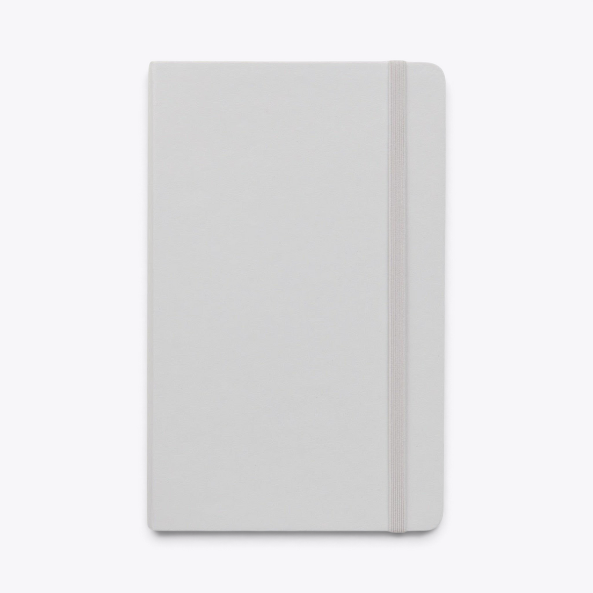 Carnet Moleskine blanc fermé avec bande élastique, vue de face