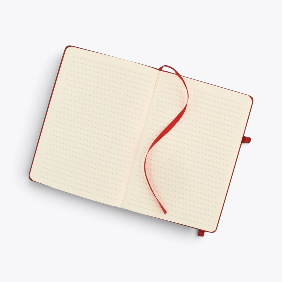 Carnet de notes rouge avec porte-stylo ouvert sur ses pages lignées
