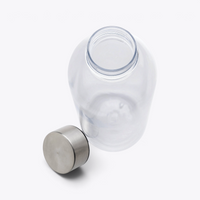 Bouteille étanche 620 ml transparente ouverte, bouchon métallique posé à côté