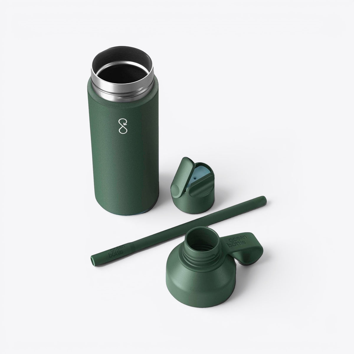 Bouteille 3-en-1 Ocean Bottle verte démontée avec bouchon, paille et module inférieur