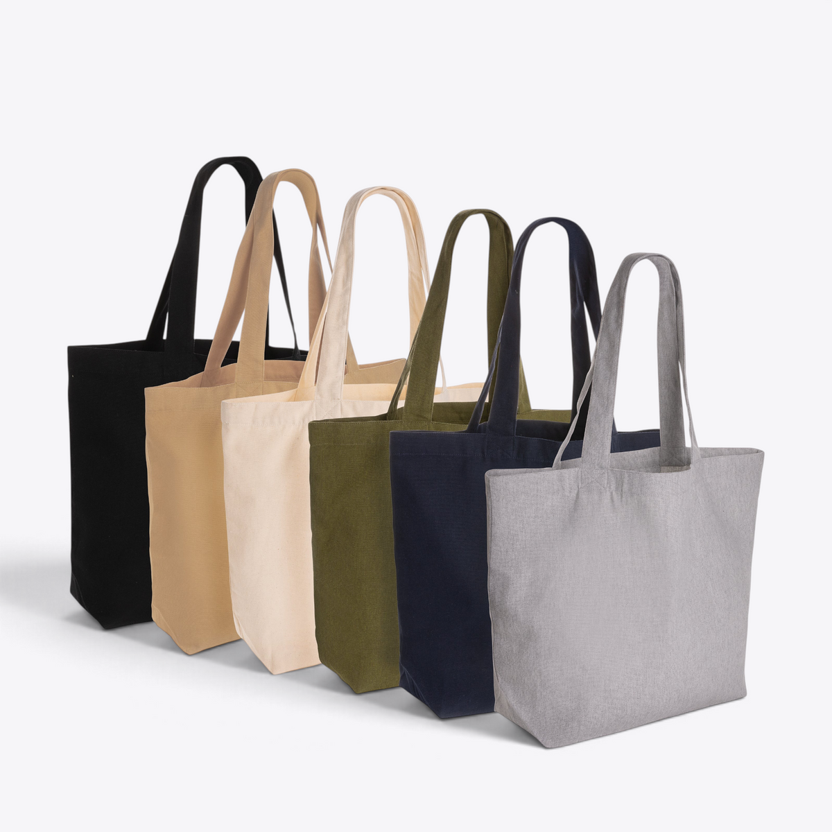 Vue groupée des différents coloris du tote bag en toile recyclée 240 g/m²