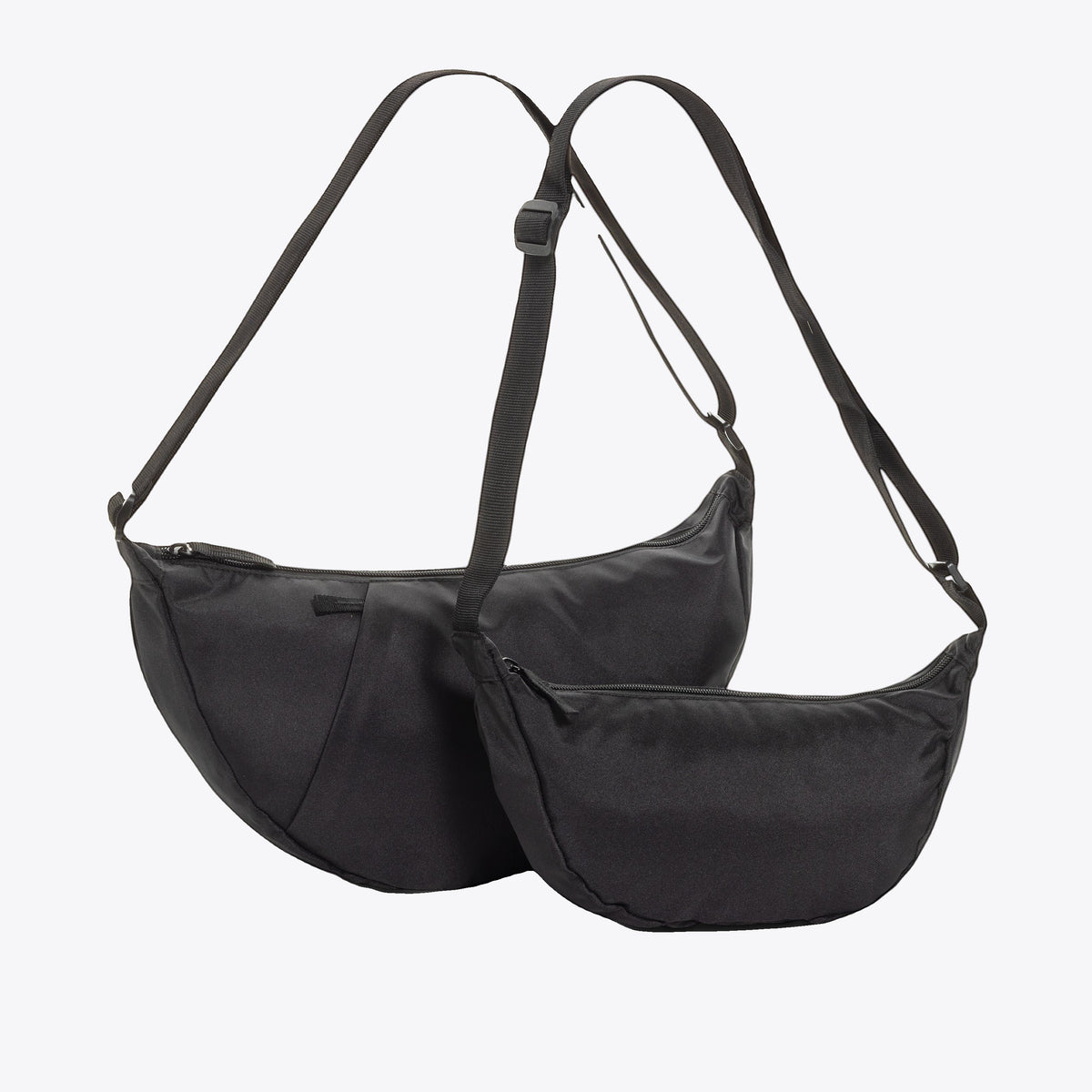 Deux sacs banane Crescent AWARE noirs, vues de face et de profil