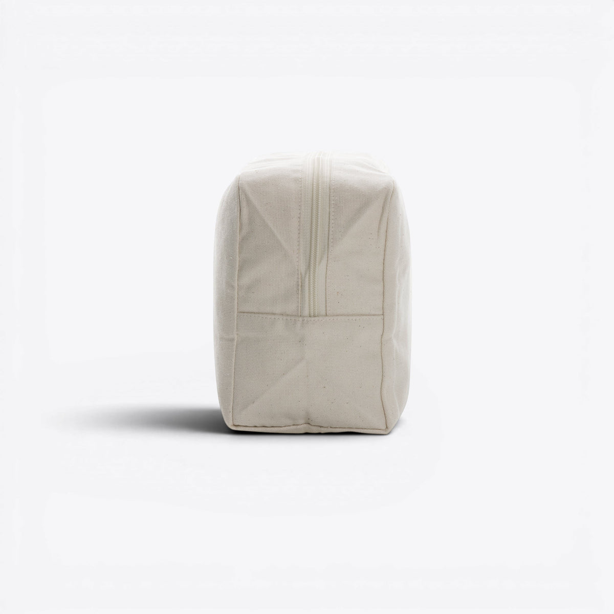 Trousse de toilette en toile recyclée non teintée Aware™ blanc cassé, profil opposé