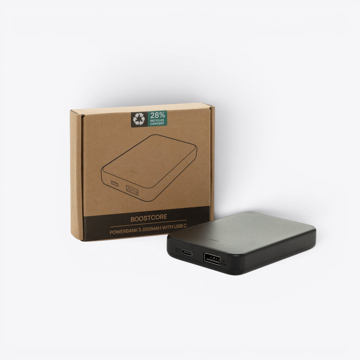 Batterie externe noire présentée avec sa boîte en carton
