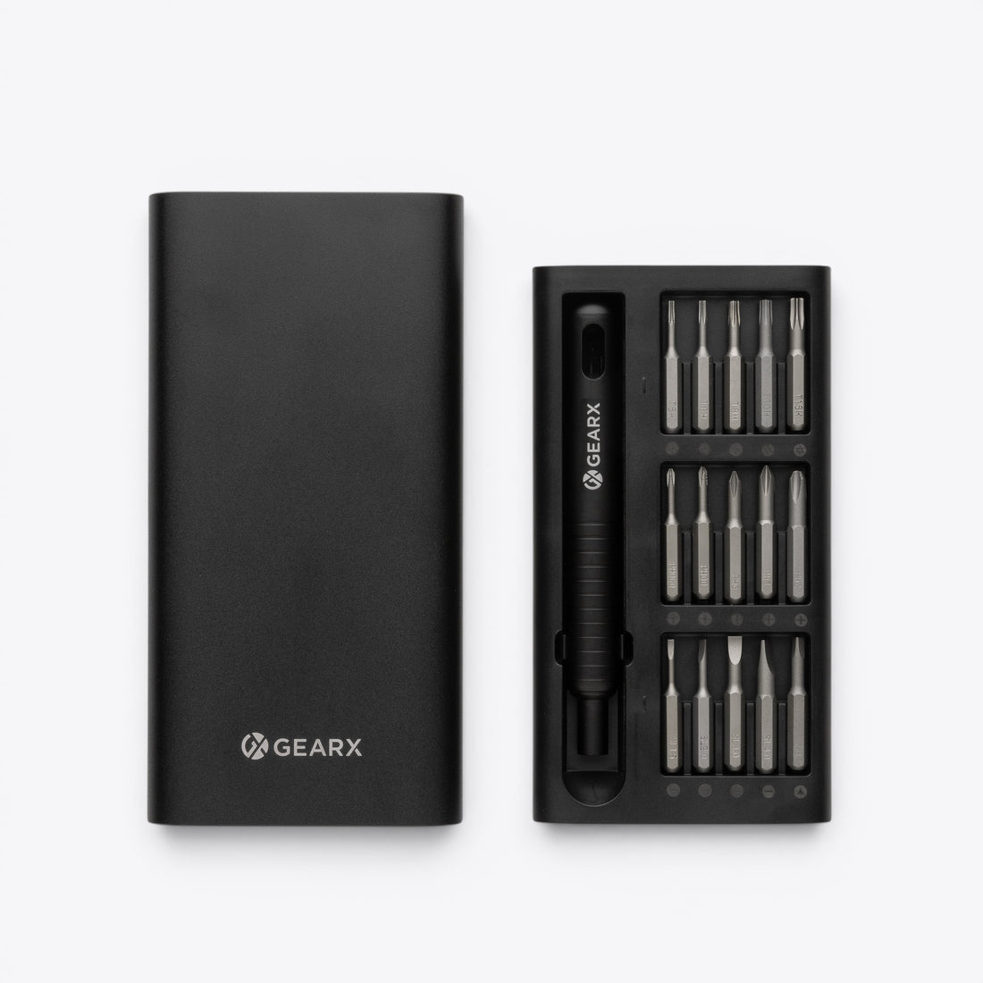 Open black screwdriver box with visible ends