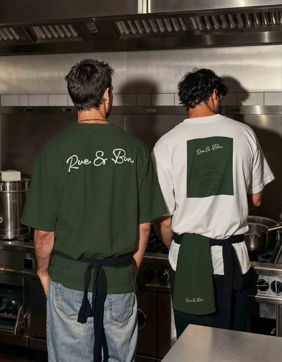 Custom T-shirts worn by a restaurant team with a printed logo.