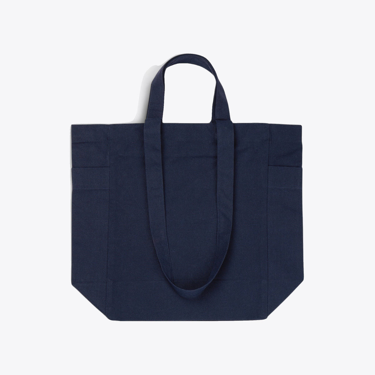 Sac cabas bleu marine déployé avec anses courtes et longues, vue de face