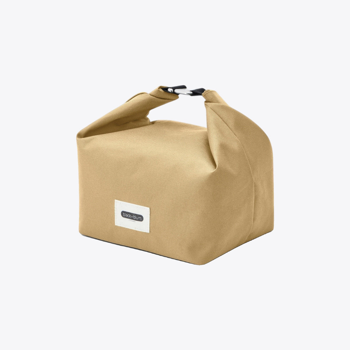 Sac déjeuner Black+Blum beige avec poignée roulée, vue de trois quarts