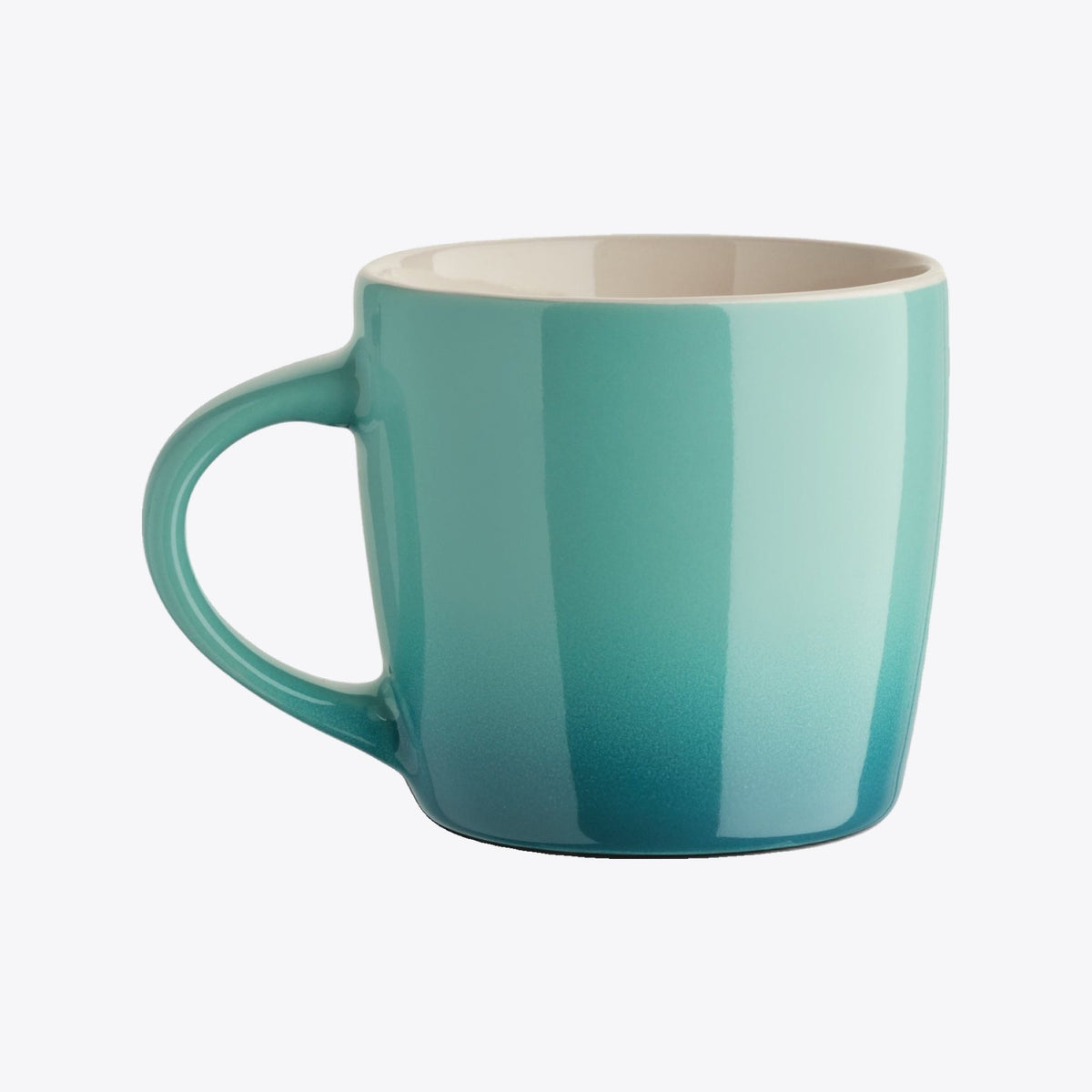 Tasse en céramique turquoise avec anse à gauche, vue de face