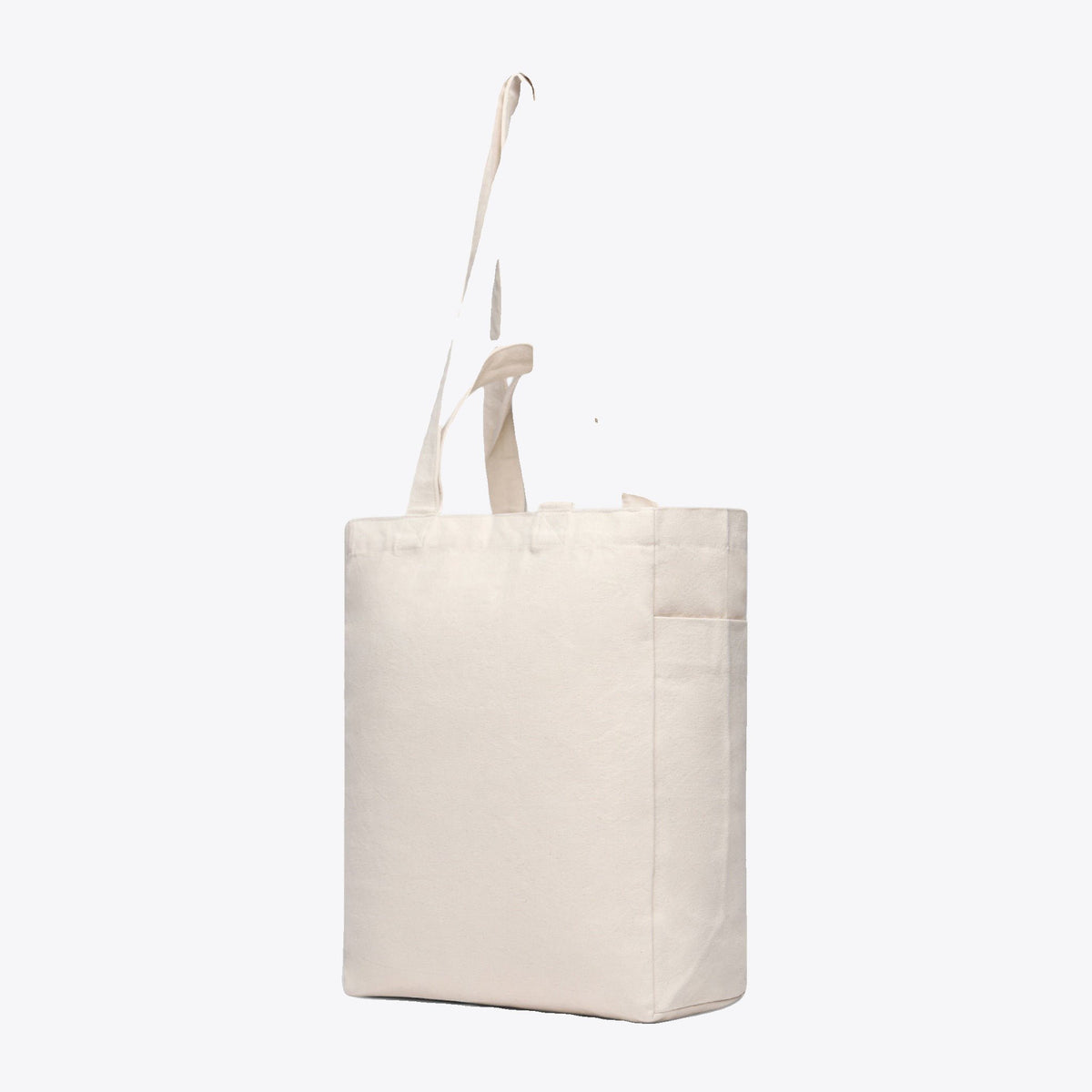 Sac cabas écru à anses courtes et longues, vue trois quarts