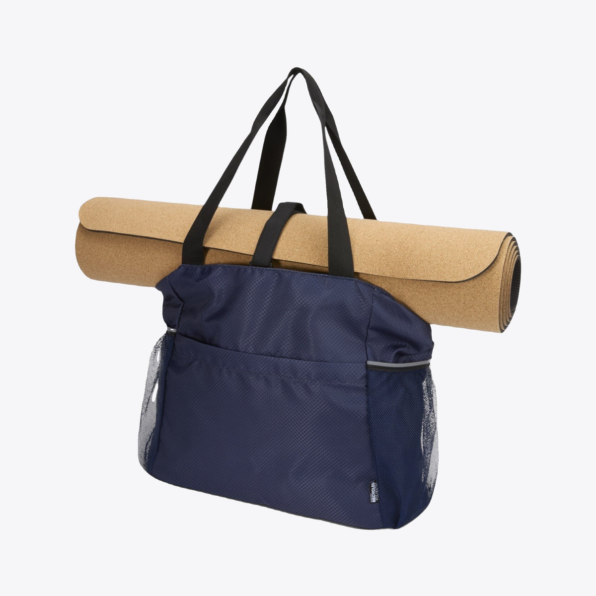 Sac de yoga bleu marine avec tapis beige maintenu sous les anses