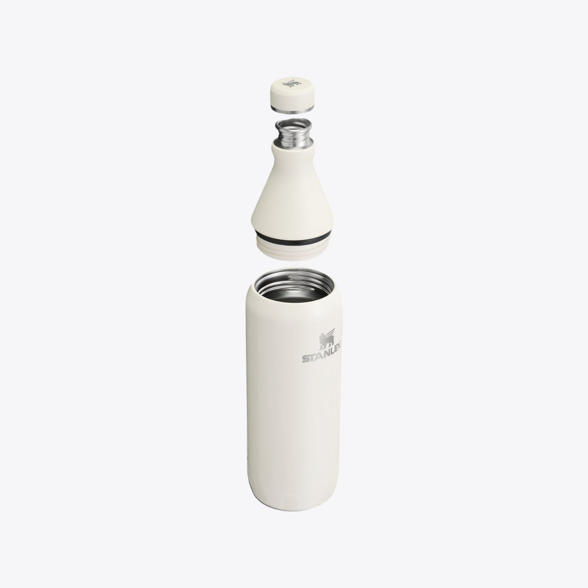 Bouteille isotherme Stanley blanc cassé ouverte avec bouchon et goulot démontés
